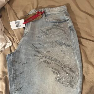 Vintage Blue Jean Shorts with Distressed Detailing